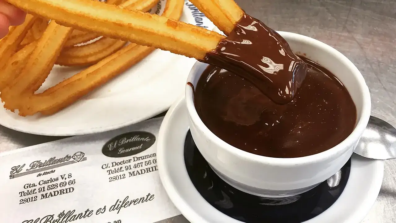 Churros dipped in chocolate